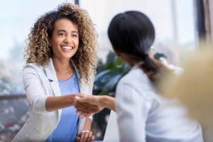 Woman Shakes Interviewer’s Hand