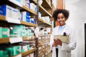 Medical assistant smiling with clipboard
