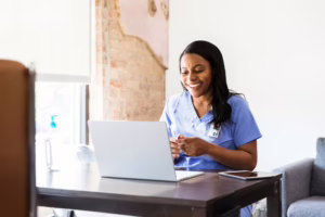 Nurse In Front Of Computer