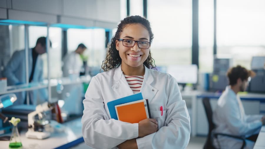 Medical assistant student wearing a lab coat