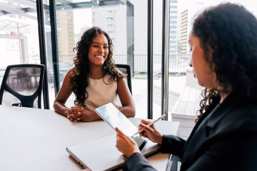 Young professional smiling at job interview